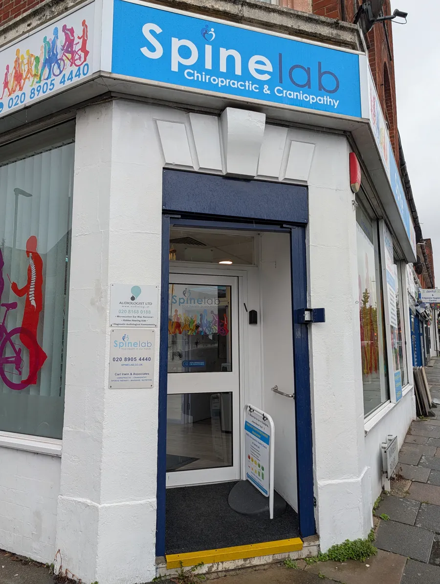The entrance to our Edgware clinic at 96 Edgware Way, via Spinelab, with the Audiologist Ltd sign